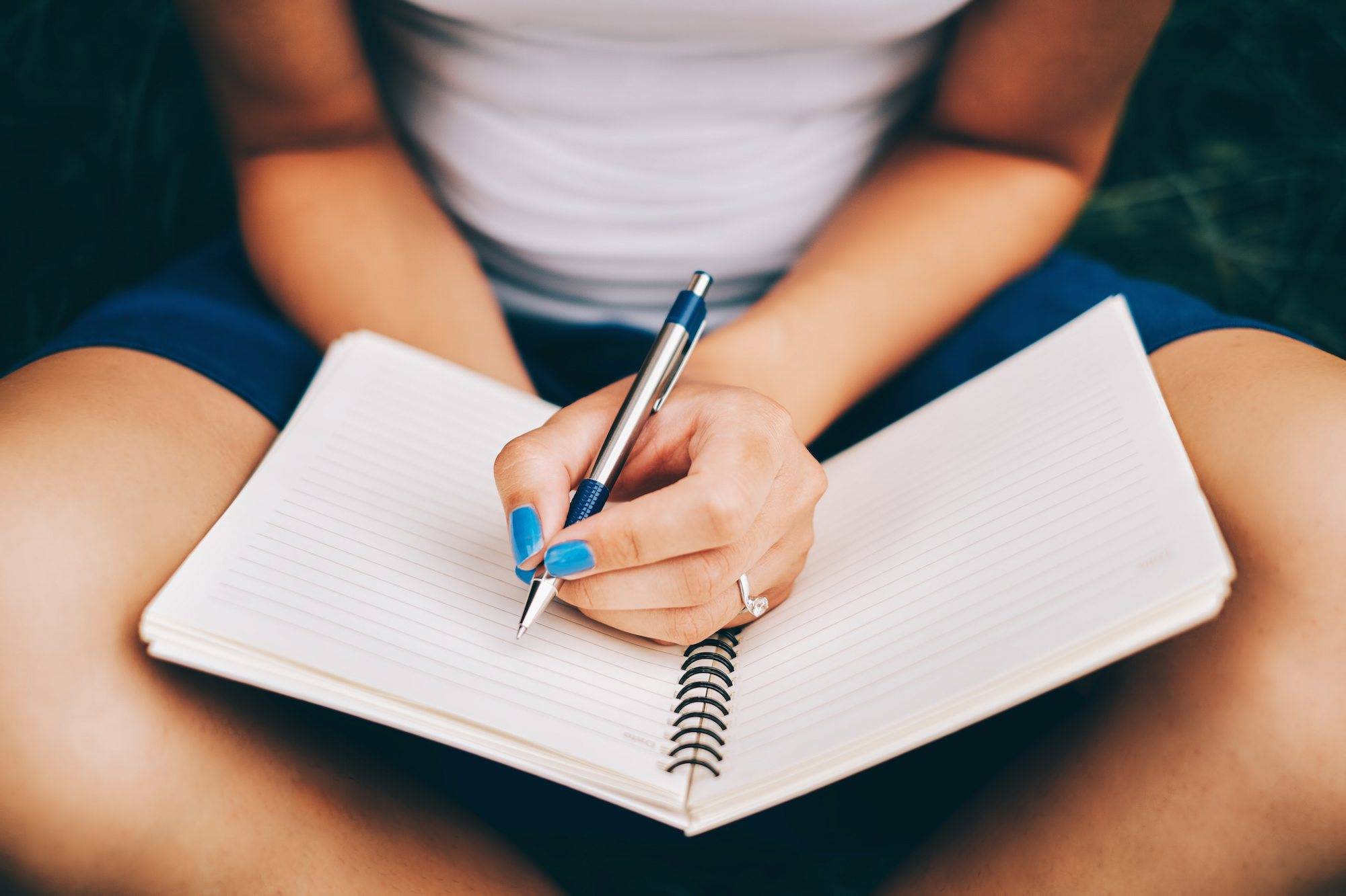 woman-writing-in-journal